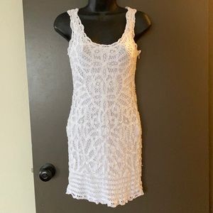 INC size 2P white, layered dress with crochet on the top layer.